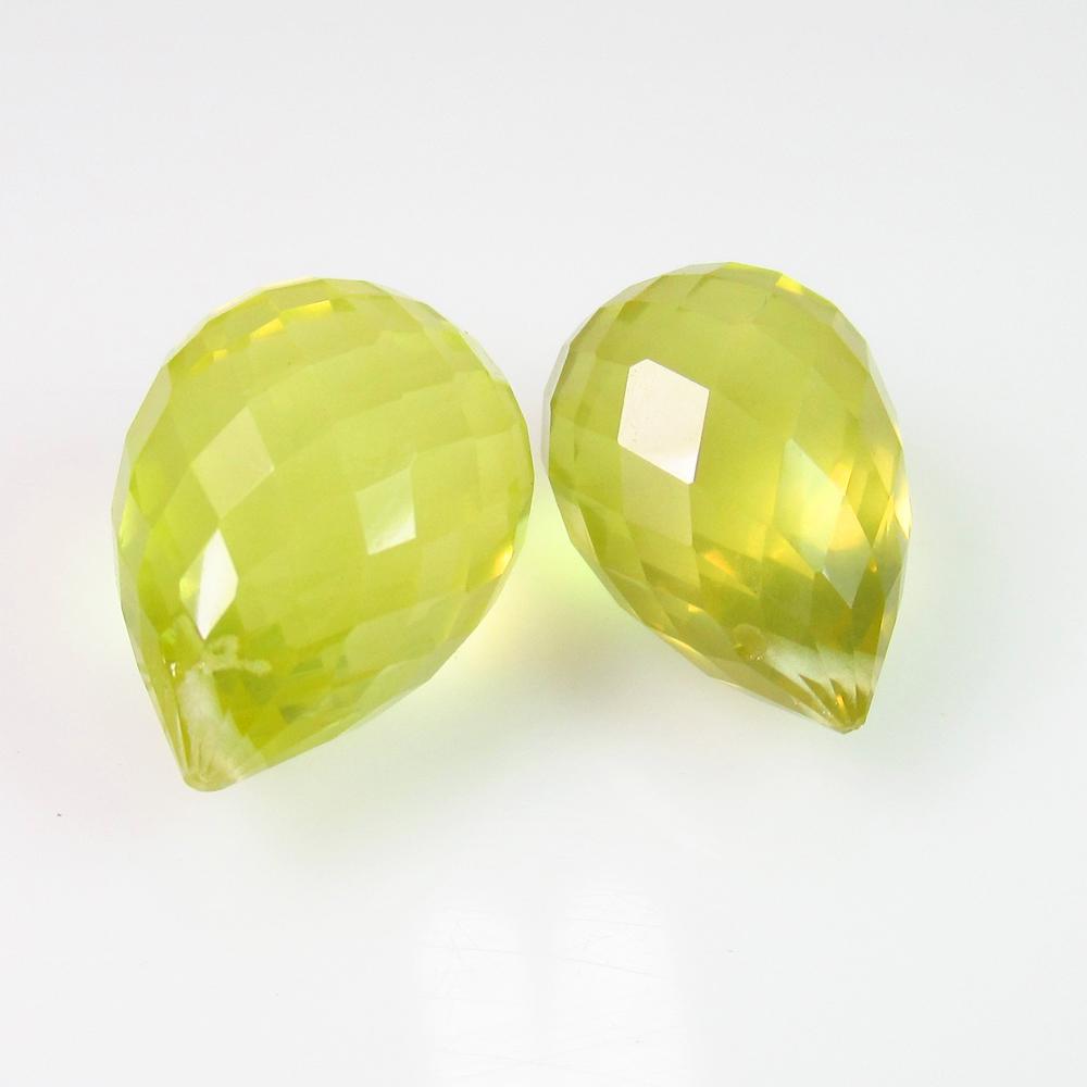 14.62 Ct Genuine Drilled Lemon Quartz Briolette Beads: No Reserve! Title: 14.62 Ct Genuine Drilled Lemon Quartz Briolette Beads Pair Stone Clarity: Transparent Loose Gemstone: Natuarl Lemon Quartz Beads Carat Weights: 14.62 Size/Dimensions: 13.50 x 10.00 