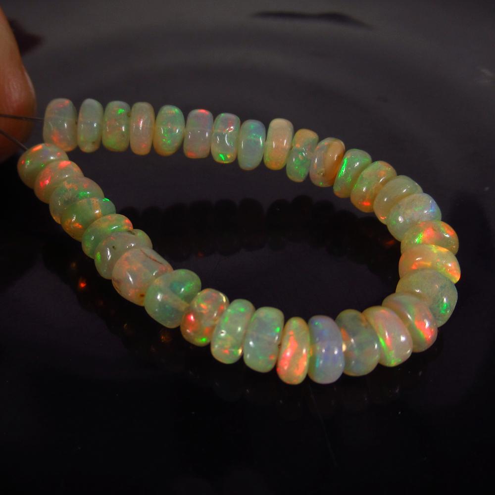 9.48 Ct Genuine 34 Ethiopian Drilled Round Opal Beads (1 of 2)