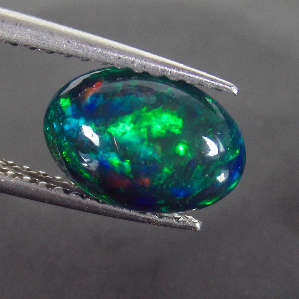 1.37 Ct Genuine Ethiopian Fire Black Opal Oval Cab (1 of 2)