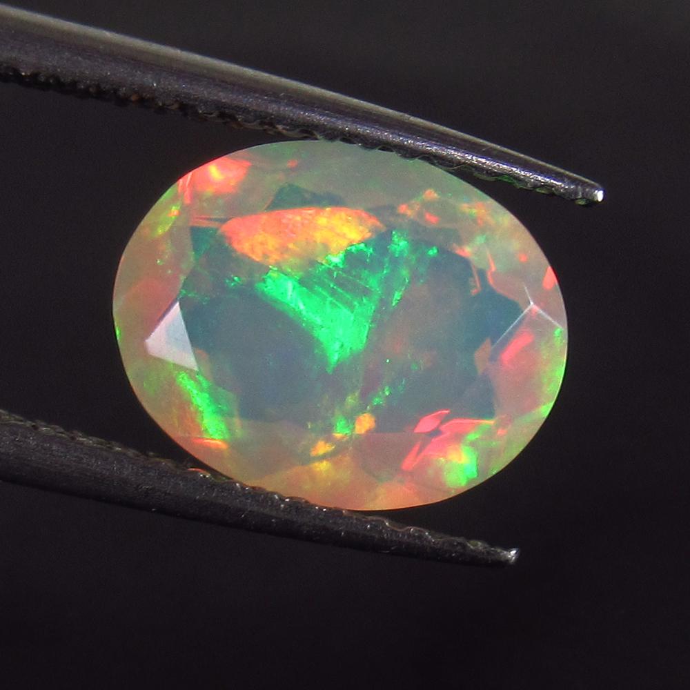 1.45 Ct Genuine Multi-Color Fire Faceted Opal Oval Cut (1 of 2)