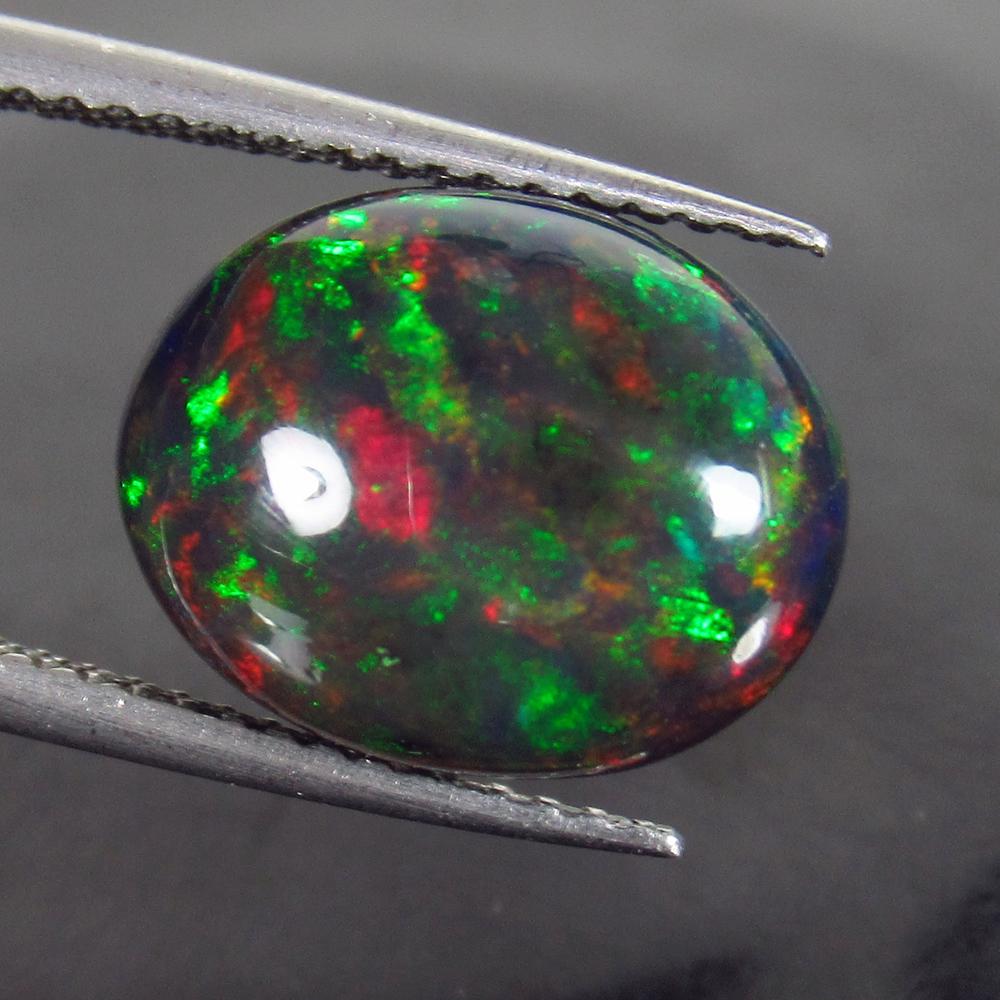 4.16 Ct Genuine Ethiopian Fire Black Opal Oval Cab (1 of 2)
