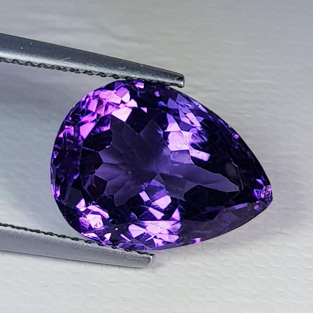 Natural Amethyst Pear Cut 8.41 ct: No Reserve! Title: Natural Amethyst Pear Cut 8.41 ct Color/Clarity: IF - VVS Loosegemstone Carat Weights: 8.41 Size/Dimensions: 14.60 x 11.10 x 9.00 Pear - Brazil Shipping: Worldwide: Flat-rate of $10