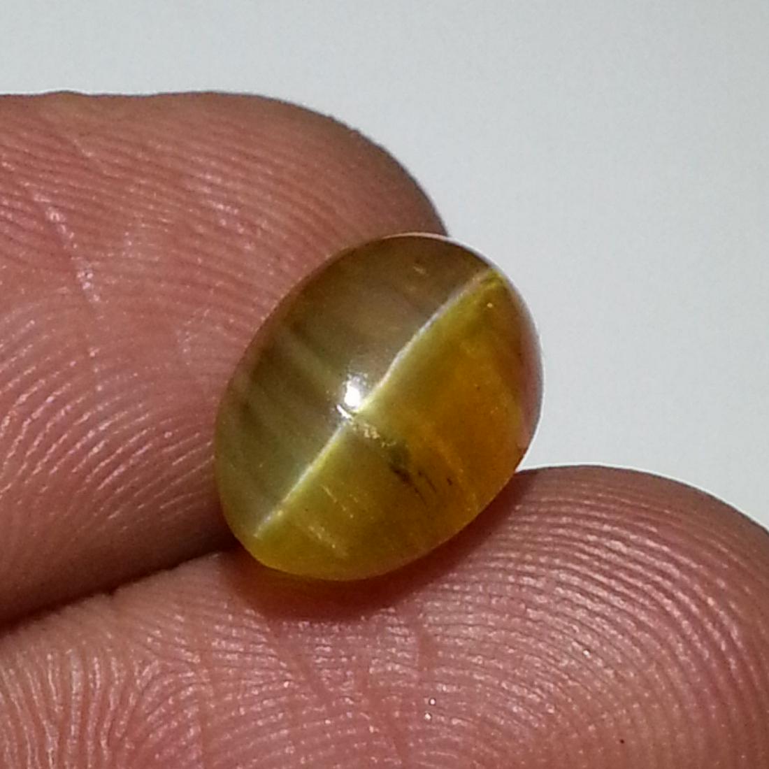 3.25 ct Natural Opal Cat's Eye: No Reserve! Title: 3.25 ct Natural Opal Cat's Eye Color/Clarity: Semi Transparent Loosegemstone Carat Weights: 3.25 Size/Dimensions: 11.20 x 7.60 x 6.70 Oval - Africa Shipping: Worldwide: Flat-rate of