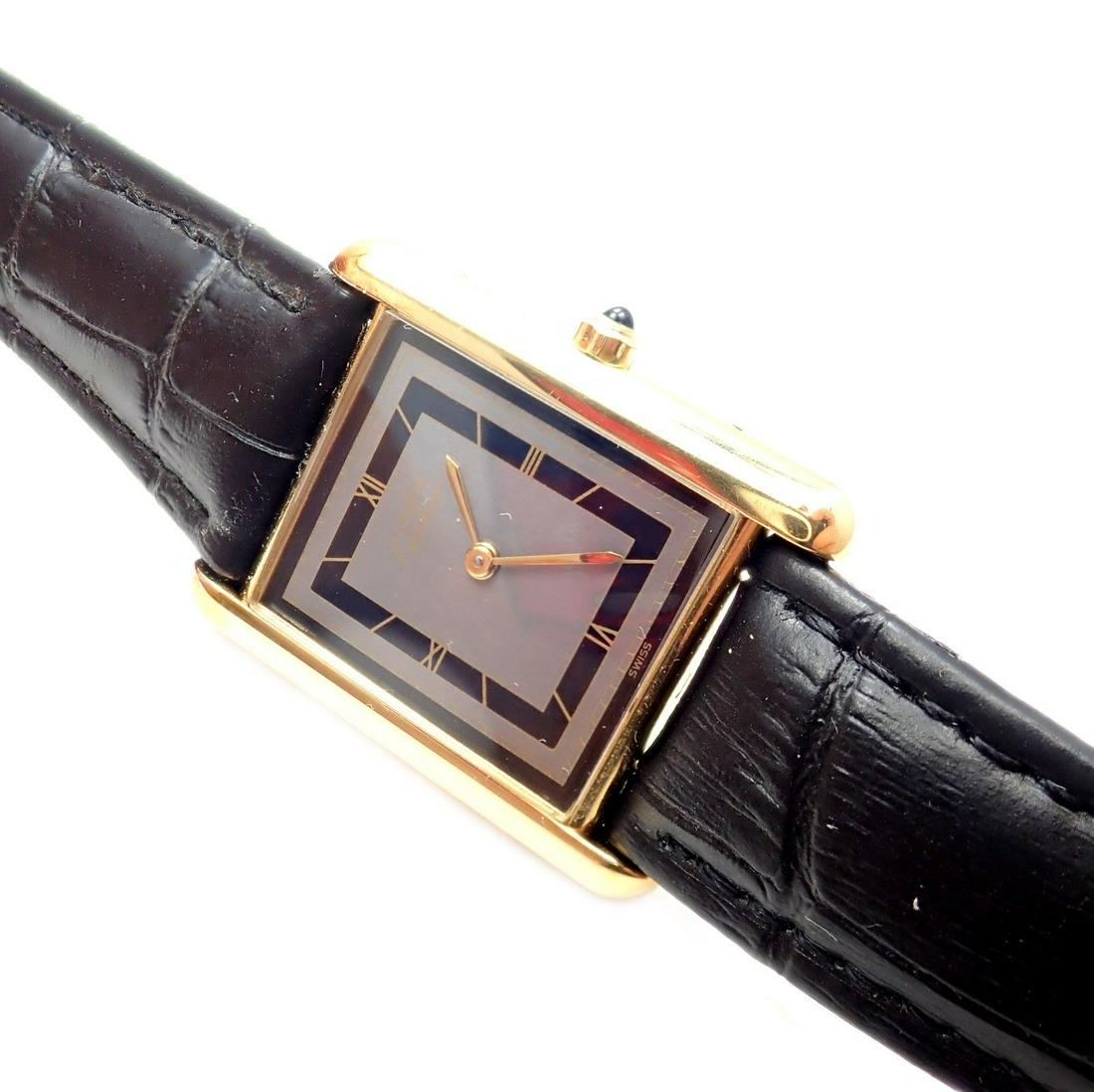 Cartier Tank Vermeil Unisex Quartz Watch: Cartier Tank Vermeil Unisex Quartz Watch You are bidding on an Cartier Tank Vermeil Unisex Quartz Watch. Brand: Cartier Case Material: 925 Vermeil Dial Color: Silver/Gold/Black Movement: Quartz Functi