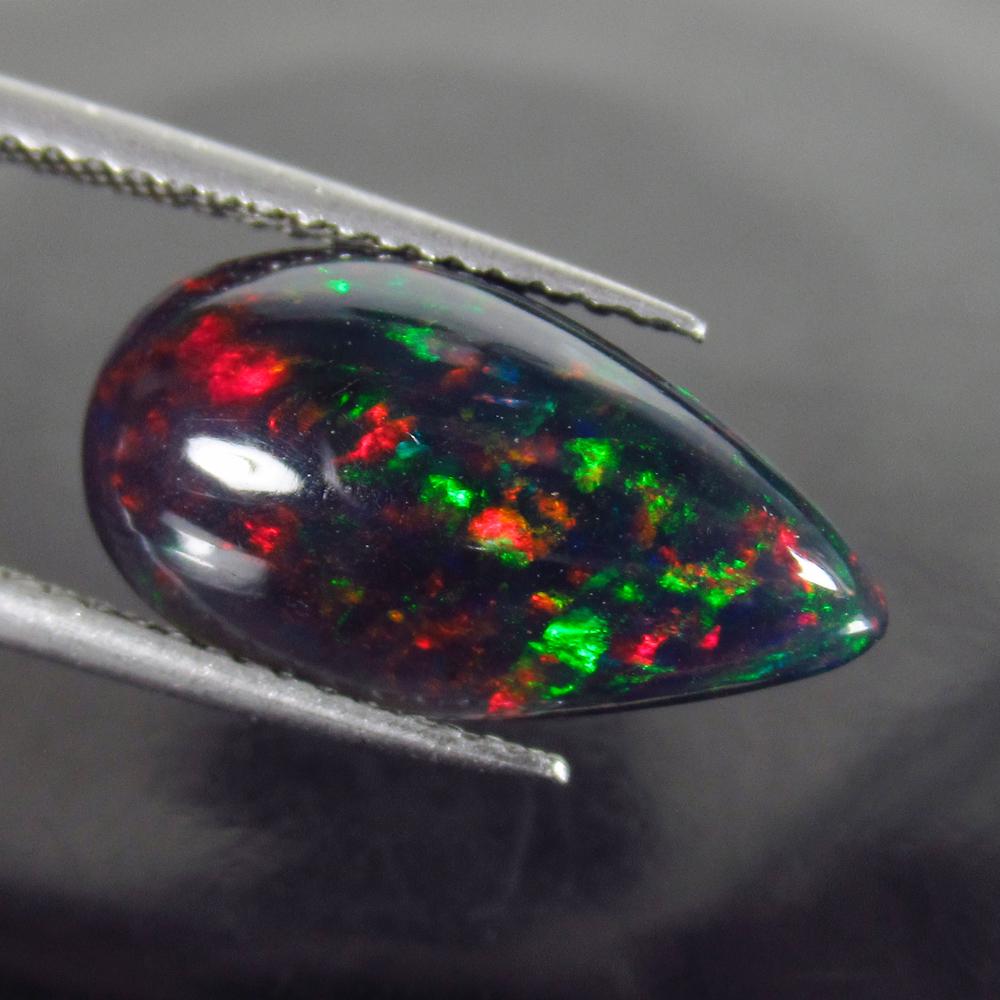 2.75 Ct Genuine Ethiopian Fire Black Opal Pear Cab (1 of 2)