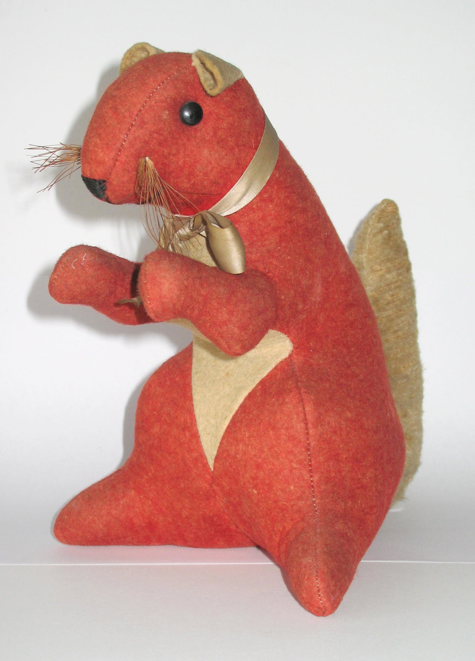 Vintage fabric red squirrel.: Title: Vintage Fabric Red Squirrel Date/Period: 1930's Dimension: 8Â” tall Provenance:Very nice early fabric red squirrel children's toy in great condition, from New England. Shipping: Domestic: Fl