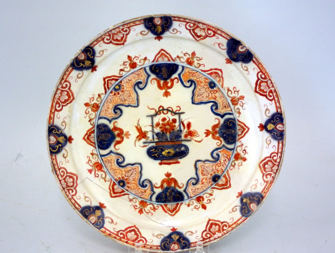 A Scarce Early 18th Century Dutch Delft Imari Plate: Title: A scarce early 18th century Dutch delft Imari plate Date/Period: c. 1710 Dimension: 8 3/4" Diam Provenance:Probably by Adrian Pynacker. Shipping: Domestic: Flat-rate of $20.00 to anywhere withi