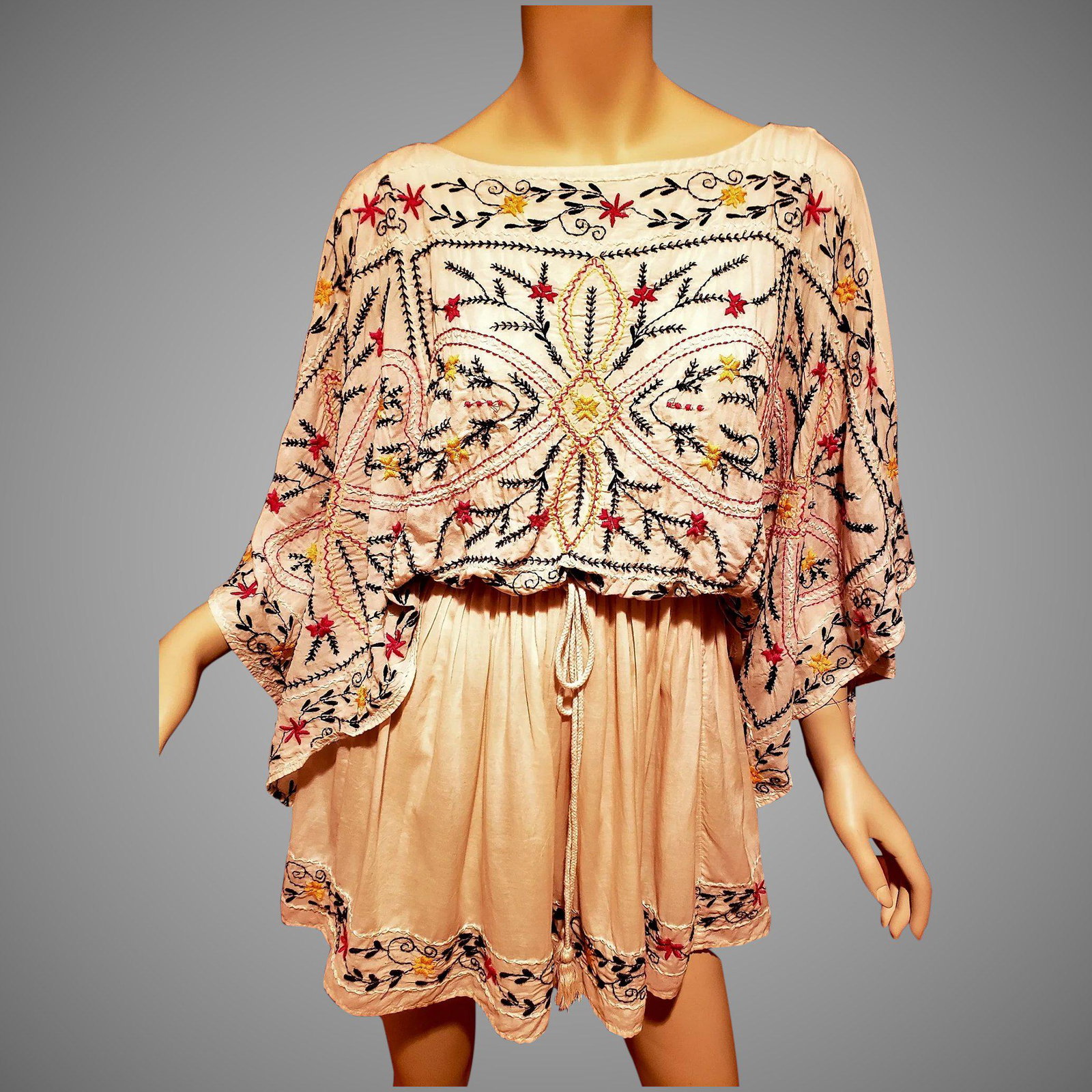 Ethnic Embroidered Boho Tunic/dress Angel sleeves: Very beautiful with amazing embroidery special Tunic/Dress with Angel flutter sleeves. Cotton/Rayon Voile very fine and fluid. Tassels rope at waist. Will fit a size small-medium This vintage item is