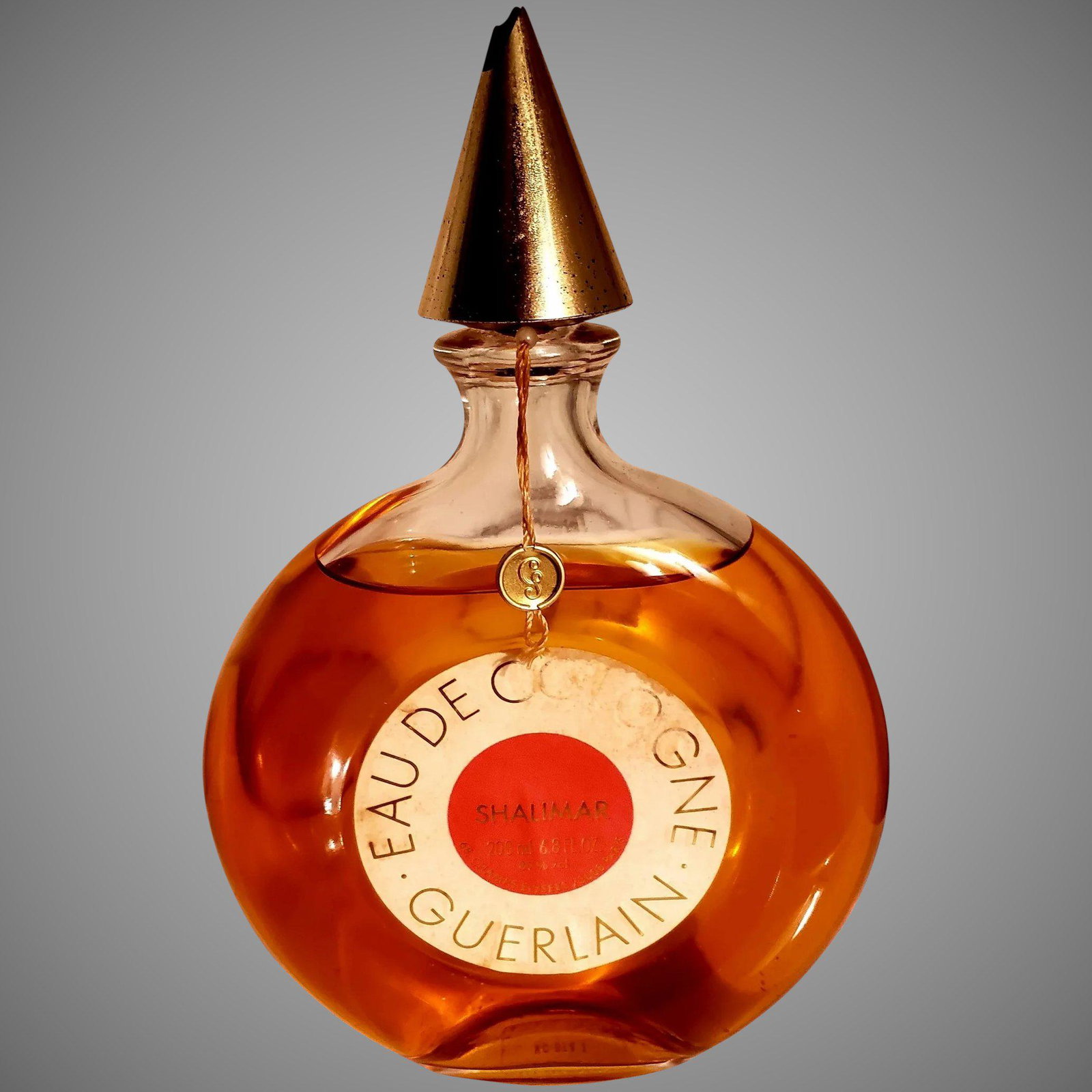 Guerlain Vintage 1967 Shalimar Eau De Cologne 6.8 Fl.Oz: Rare Guerlain Montre 6.8 Fl.Oz - 200 Ml Shalimar Eau De Cologne almost full little evaporation. In very good vintage condition bottle is undamaged only the gold cap has a bit of a chip. Carries the se