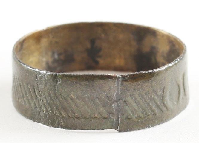 ANCIENT VIKING WEDDING RING C.850-1050 AD SIZE 6: ANCIENT VIKING WEDDING RING C.850-1050 AD SIZE 6 Broad, 5.7mm, flat-faced band, with medial hand stippled band.. Fine preservation. Vikings exchanged rings on the pommel of the groomÂ’s sword. Gift