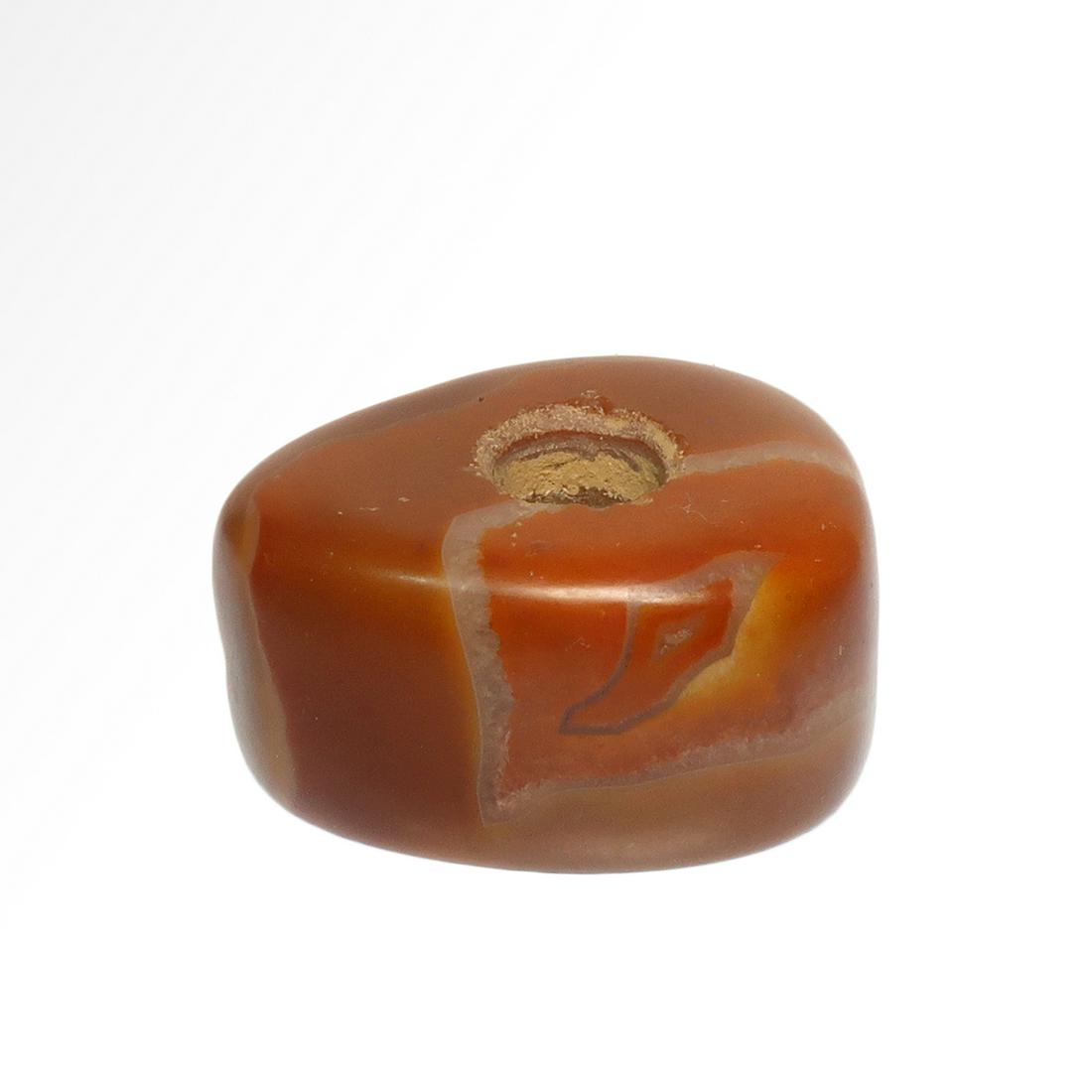 Near Eastern Agate Axe Amulet, c. 2nd Millennium B.C.: Title: Near Eastern Agate Axe Amulet, c. 2nd Millennium B.C. Date and Origin: Near East, c. 2nd Millennium B.C. Description: Carved in banded agate of red, pink and white colours in the shape of a sto