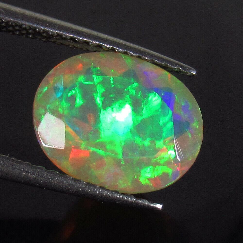 1.92 Ct Genuine Multi-Color Fire Faceted Opal Oval Cut (1 of 2)
