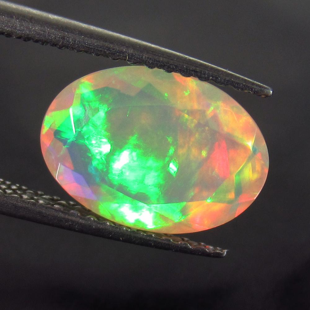 1.84 Ct Genuine Multi-Color Faceted Fire Opal Oval Cut (1 of 2)