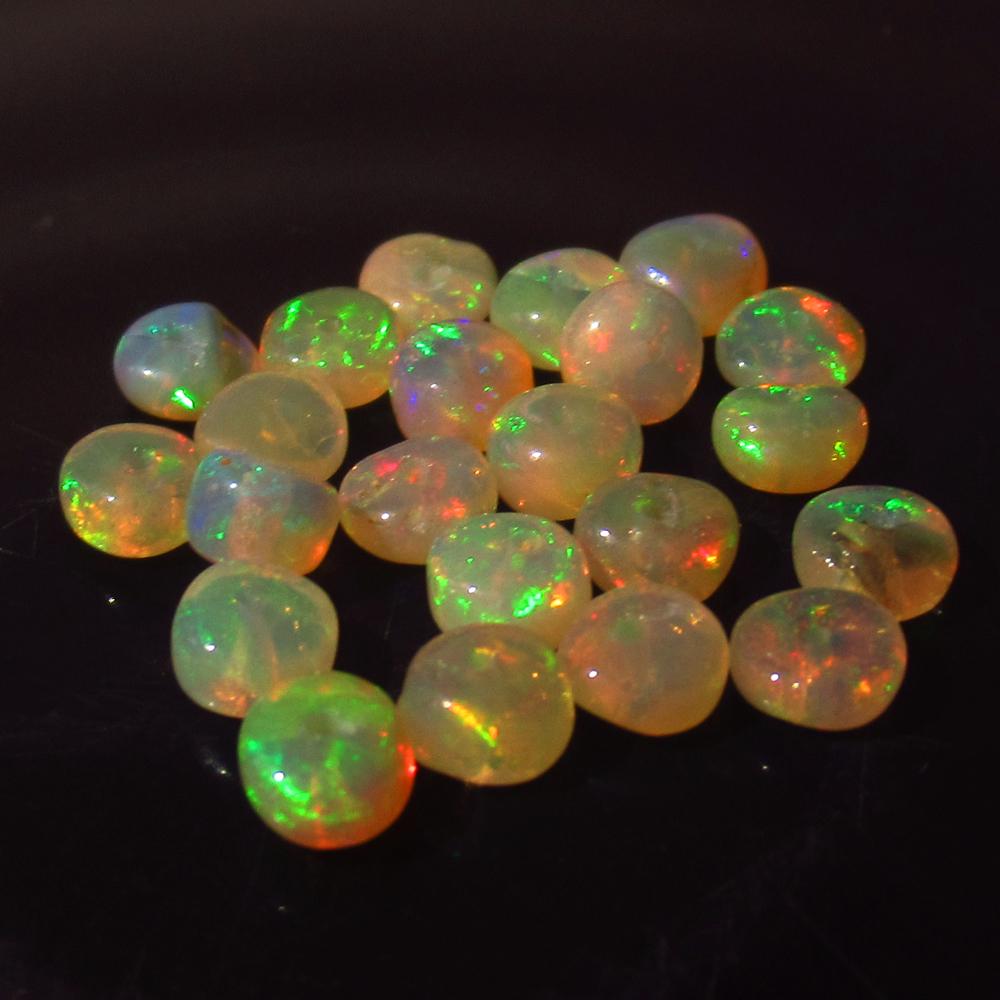 5.40 Ct Genuine 22 Ethiopian Drilled Round Fire Opal: No Reserve! Title: 5.40 Ct Genuine 22 Ethiopian Drilled Round Fire Opal Beads Stone Clarity: Transparent Loose Gemstone: Natural Opal Beads Carat Weights: 5.40 Size/Dimensions: 4.50 to 4.80 mm / 22 PC