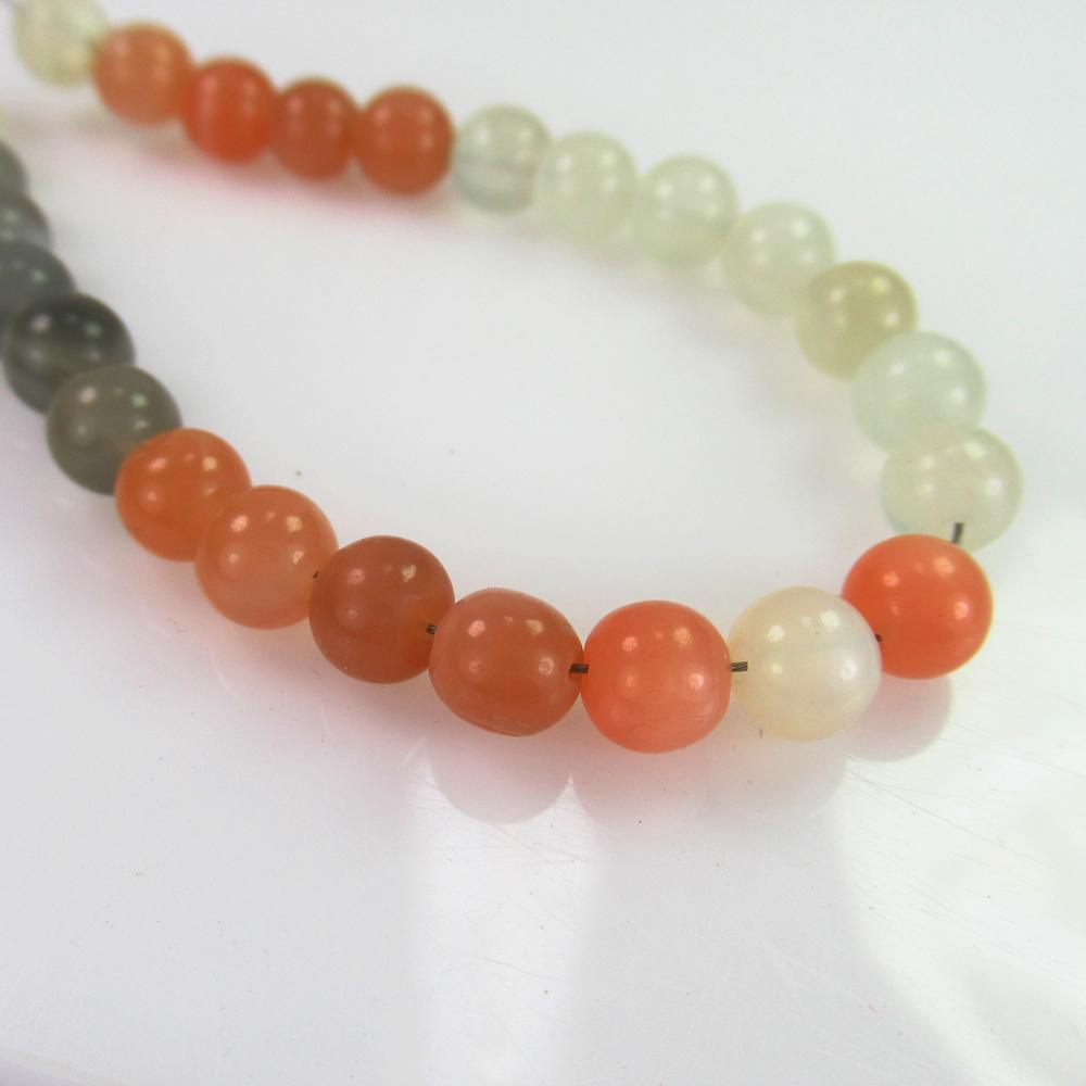 22.17 Ct Genuine 26 Drilled Moonstone Ball Beads: No Reserve! Title: 22.17 Ct Genuine 26 Drilled Moonstone Ball Beads Stone Clarity: Semi-TransparentLoose Gemstone: Natural Moonstone Beads Carat Weights: 22.17 Size/Dimensions: 5.30 - 5.50 mm / 22 PC'