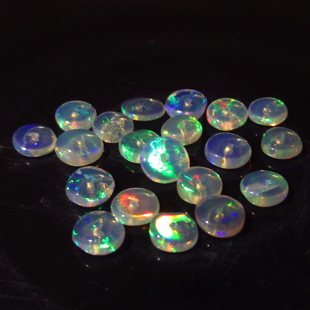 4.08 Ct Genuine 22 Ethiopian Drilled Round Opal Beads: No Reserve! Title: 4.08 Ct Genuine 22 Ethiopian Drilled Round Opal Beads Stone Clarity: Transparent Loose Gemstone: Natural Opal Beads Carat Weights: 4.08 Size/Dimensions: 4.50 to 5.00 mm / 22 PC's Dr