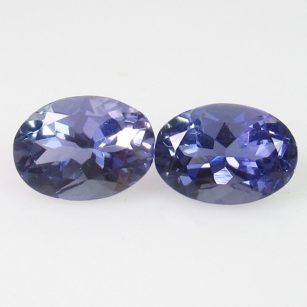 1.37 Ctw Natural Iolite 7X5 mm Oval Pair: No Reserve! Title: 1.37 Ctw Natural Iolite 7X5 mm Oval Pair Stone Clarity: VVS Gemstone: Iolite Carat Weights: 1.37 Size/Dimensions: 7.00 x 5.10 x 4.00 mm / 2 PC's Very Good Luster / Excellent Oval Ma