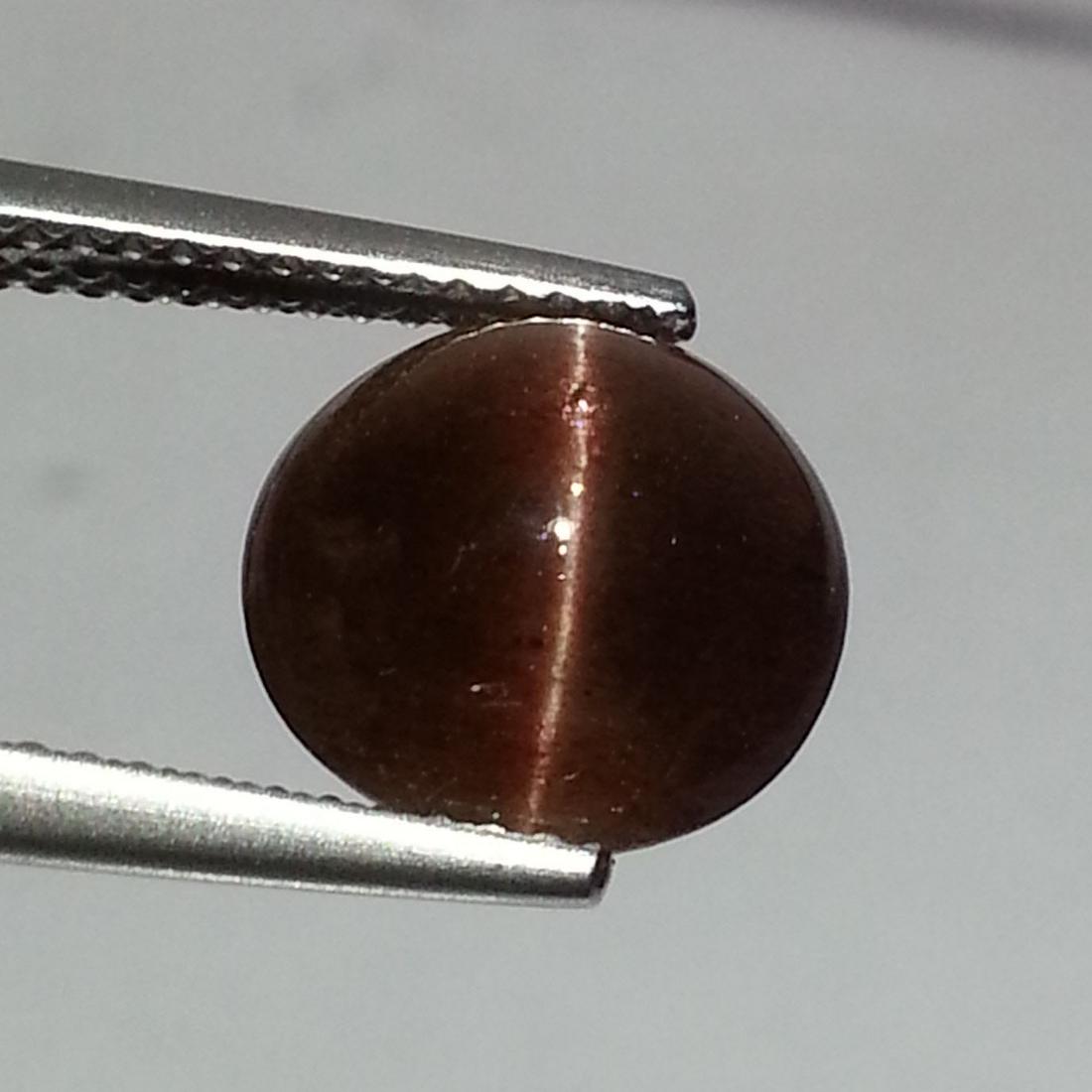 4.12 ct Natural Scapolite Cat's Eye: No Reserve! Title: 4.12 ct Natural Scapolite Cat's Eye Color/Clarity: Opaque Gemstones: Loosegemstone Carat Weights: $4 Size/Dimensions: 10.00 x 10.00 x 5.90 Additional Information: Round - Africa Shi