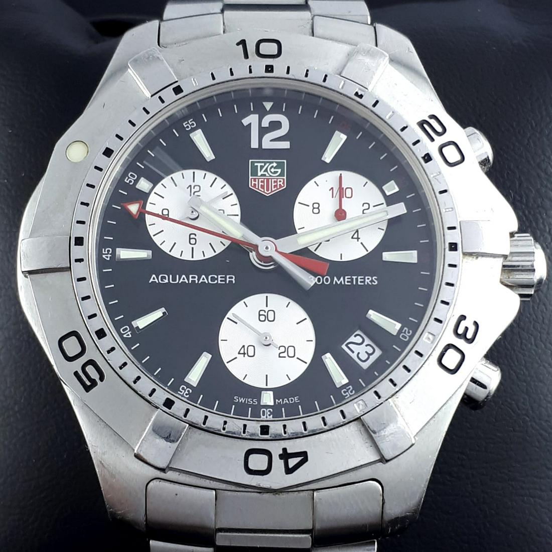 TAG Heuer - Aquaracer 300M Chronograph - CAF1110 - Men: Brand: TAG Heuer Model: Aquaracer 300M Chronograph Reference number: CAF1110 Gender: Men Period: 2011-present Movement: Quartz Case material: Steel Extras: Box, Documents Type: Chronograph wristwatch 