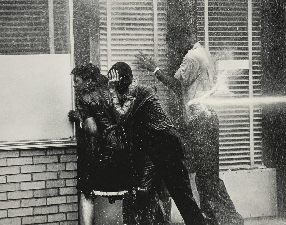CHARLES MOORE - Birmingham Riots, 1963: Artist: Charles Moore Title: Birmingham Riots, 1963 Medium: Photo Litho, 1995, USA Dimensions: 7.4x5.85" Heat Wax Mounted on 8.5x11" Conservation Board Charles Lee Moore (1931 – 2010) was an America
