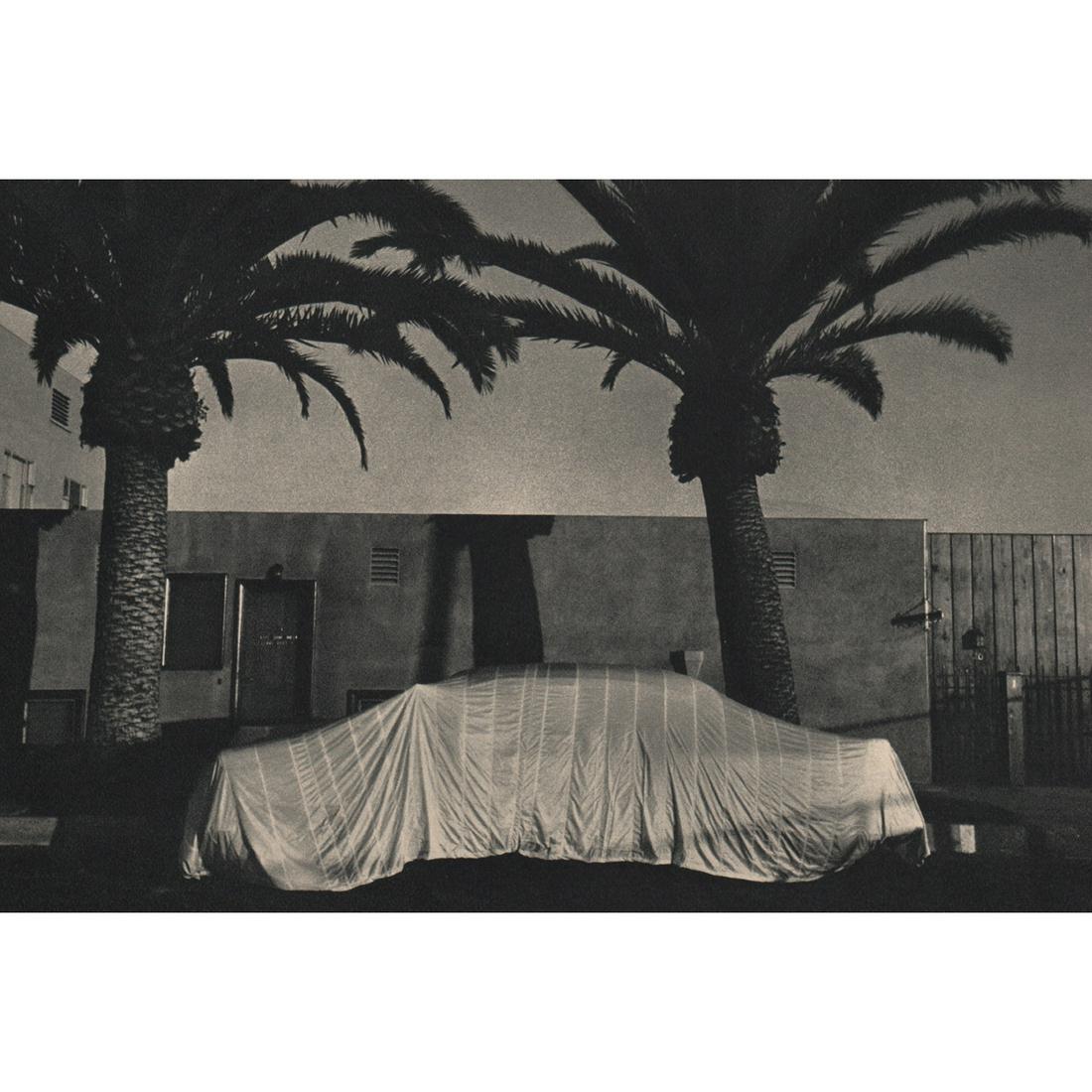 ROBERT FRANK - Long Beach, California: Artist: ROBERT FRANK Print Title: Long Beach, California Medium: Sheet-fed Gravure Printing Date: 1960's Printed in Switzerland Image Size approx: 5.5 x 8.5 inches Robert Frank (b. 1924) is an America