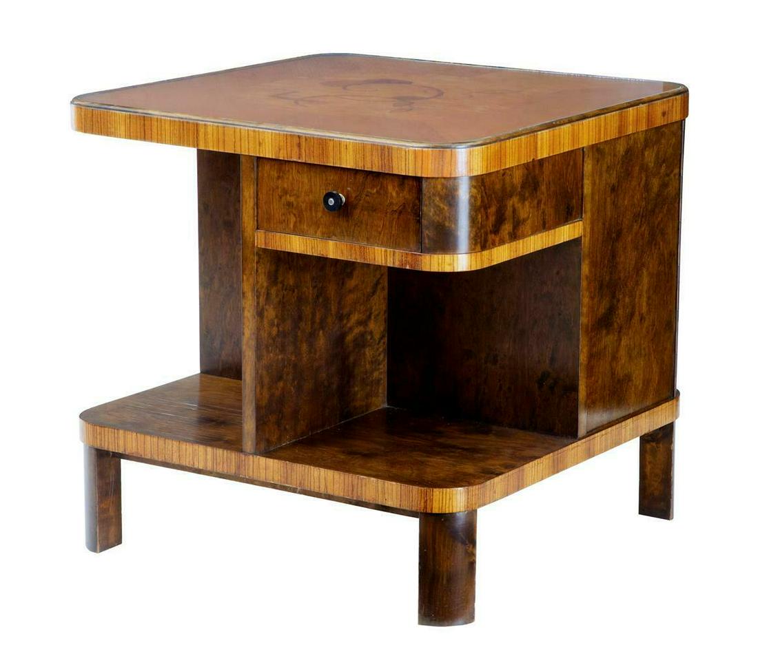 20TH CENTURY ART DECO BIRCH INLAID OCCASIONAL TABLE: 20TH CENTURY ART DECO BIRCH INLAID OCCASIONAL TABLE ROUNDED SQUARE IN SHAPE WITH A DRAWER, SINGLE DOOR CUPBOARD AND OPEN STORAGE SPACES. INLAID TOP WITH REMOVABLE GLASS PROTECTION. HEIGHT: 23" WIDTH: 