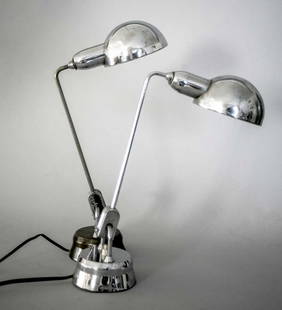 Pair of French modernist Jumo desk lamp attributed to: French modernist desk lamp made in the 1940's by Jumo , an important lamp making company from France who used the best designer of their time. Charlotte Perriand used it in her design work , I