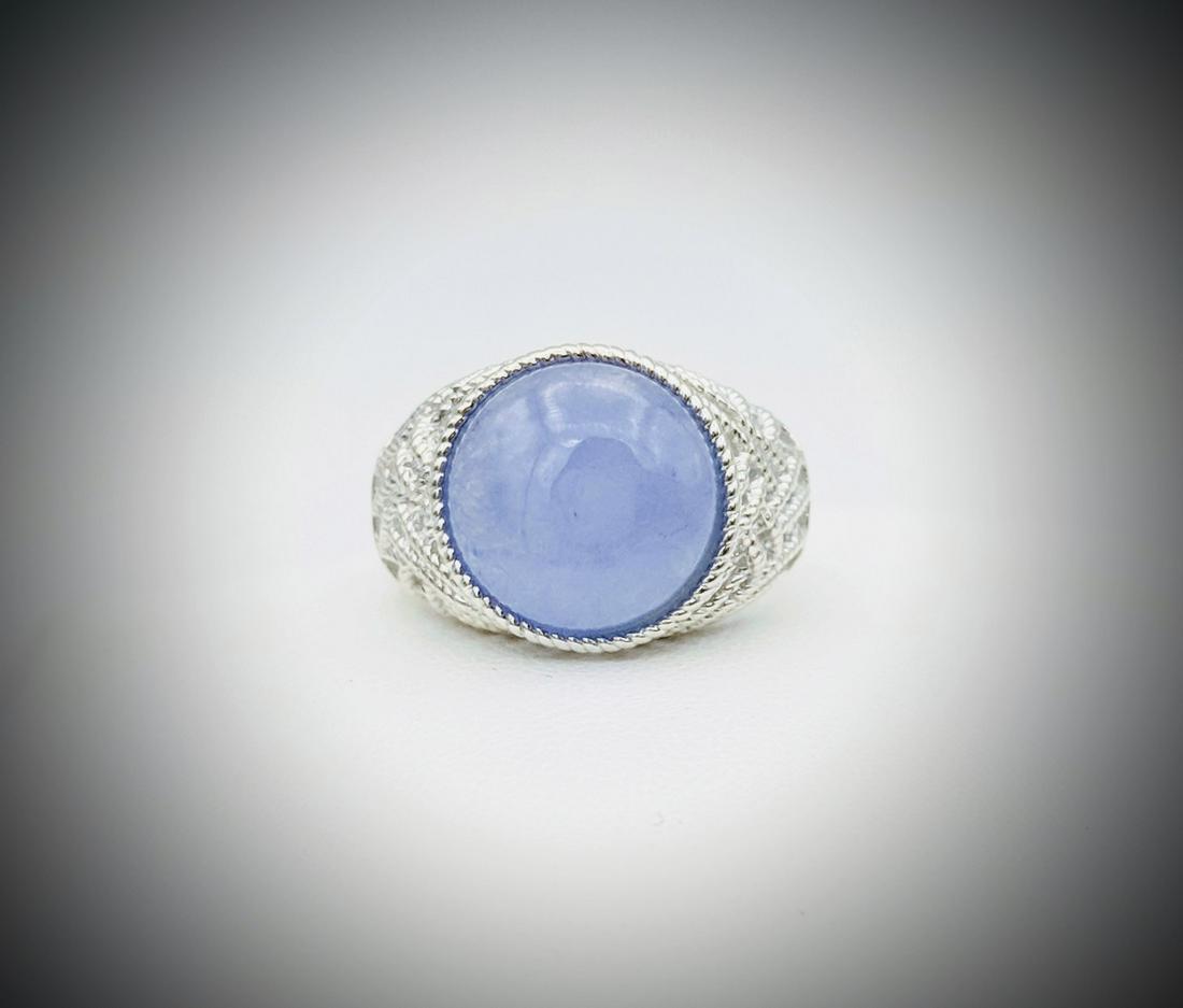 Sterling Silver Sz 7 Chalcedony Ring: Title: Sterling Silver Sz 7 Chalcedony Ring Brand: Jean Lin Collection Metal Purity: 925 Sterling Silver Gemstones: Chalcedony Carat Weights: 1 Round Chalcedony at 13mm. Size/Dimensions: 7 Reserve: $3