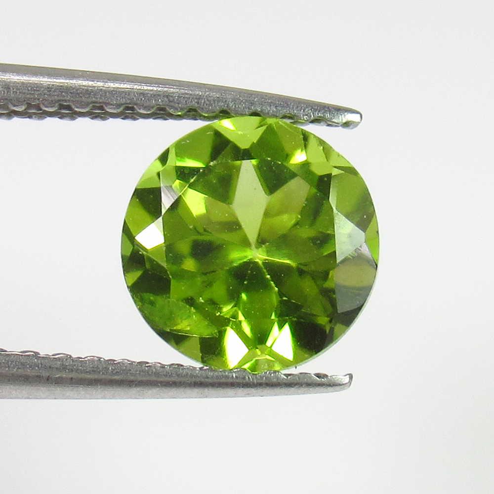 1.24 Ctw Natural Pakistan Peridot 7 mm Round Cut: No Reserve! Title: 1.24 Ctw Natural Pakistan Peridot 7 mm Round Cut Stone Clarity: VVS Gemstones: Peridot Carat Weights: 1.24 Size/Dimensions: 7.00 x 7.00 x 4.20 mm Additional Information: Top Class L