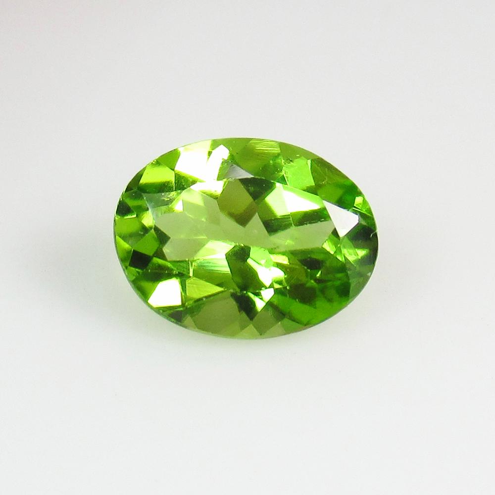 1.72 Ctw Natural Pakistan Peridot Oval Cut: No Reserve! Title: 1.72 Ctw Natural Pakistan Peridot Oval Cut Stone Clarity: VVS Gemstones: Peridot Carat Weights: 1.72 Size/Dimensions: 8.90 x 6.80 x 4.10 mm Additional Information: Top Class Luster 