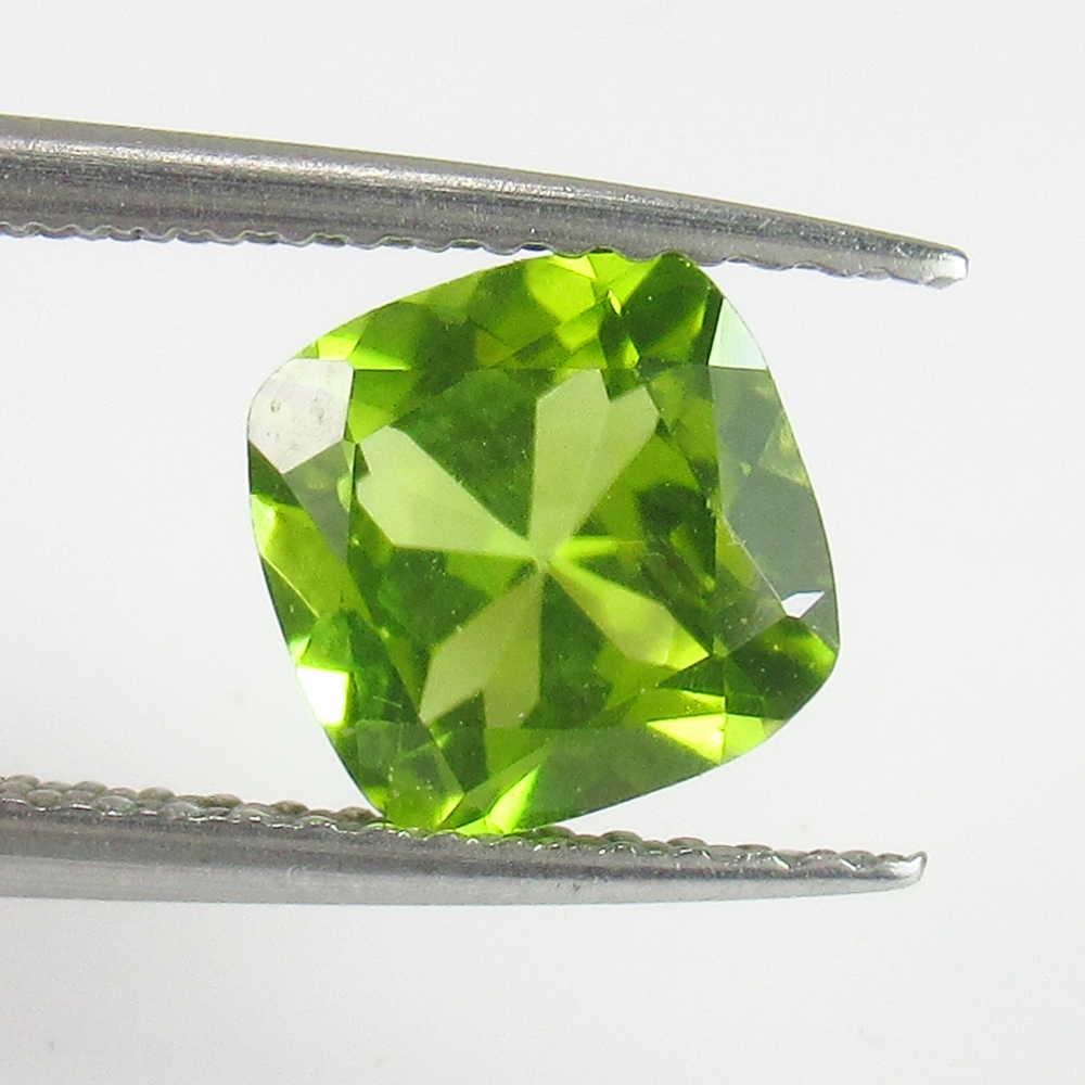 1.61 Ctw Natural Pakistan Peridot Cushion Cut: No Reserve! Title: 1.61 Ctw Natural Pakistan Peridot Cushion Cut Stone Clarity: VVS Gemstones: Peridot Carat Weights: 1.61 Size/Dimensions: 6.90 x 7.00 x 4.20 mm Additional Information: Top Class Lust