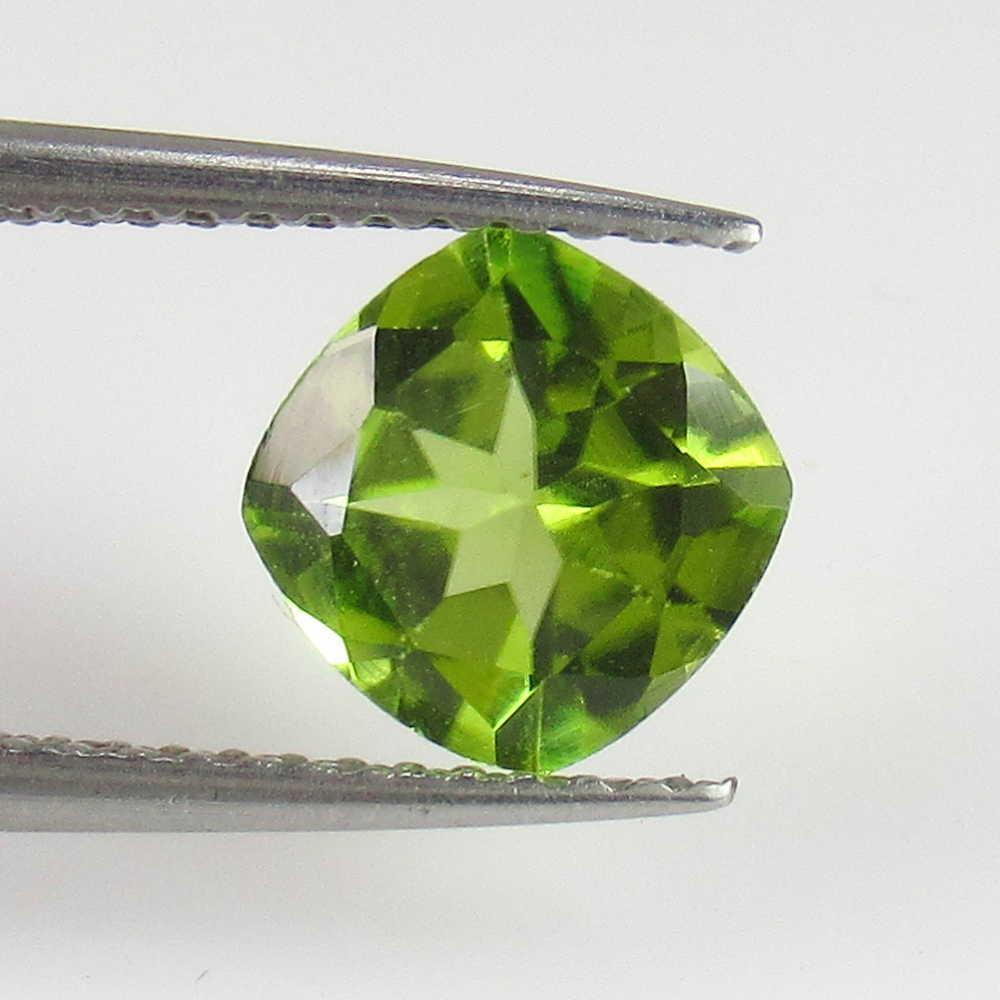 1.57 Ctw Natural Pakistan Peridot Cushion Cut: No Reserve! Title: 1.57 Ctw Natural Pakistan Peridot Cushion Cut Stone Clarity: VVS Gemstones: Peridot Carat Weights: 1.57 Size/Dimensions: 7.10 x 7.00 x 4.20 mm Additional Information: Top Class Lust