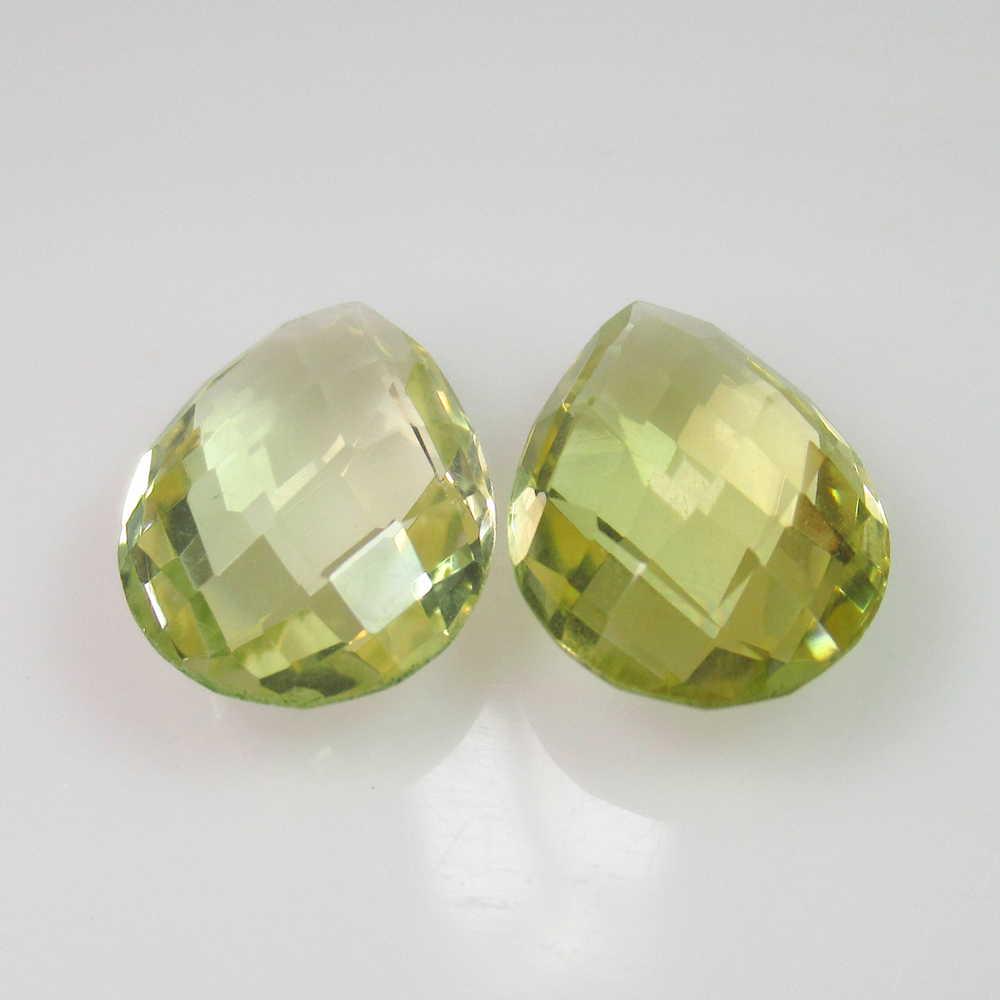 9.24 Ct Genuine Lemon Quartz Pear Checkerboard Pair: No Reserve! Title: 9.24 Ct Genuine Lemon Quartz Pear Checkerboard Pair Stone Clarity: VVS Gemstone: Natuarl Lemon Quartz Carat Weights: 9.24 Size/Dimensions: 14.20 x 10.20 x 5.70 mm / 2 PC's Top Quali