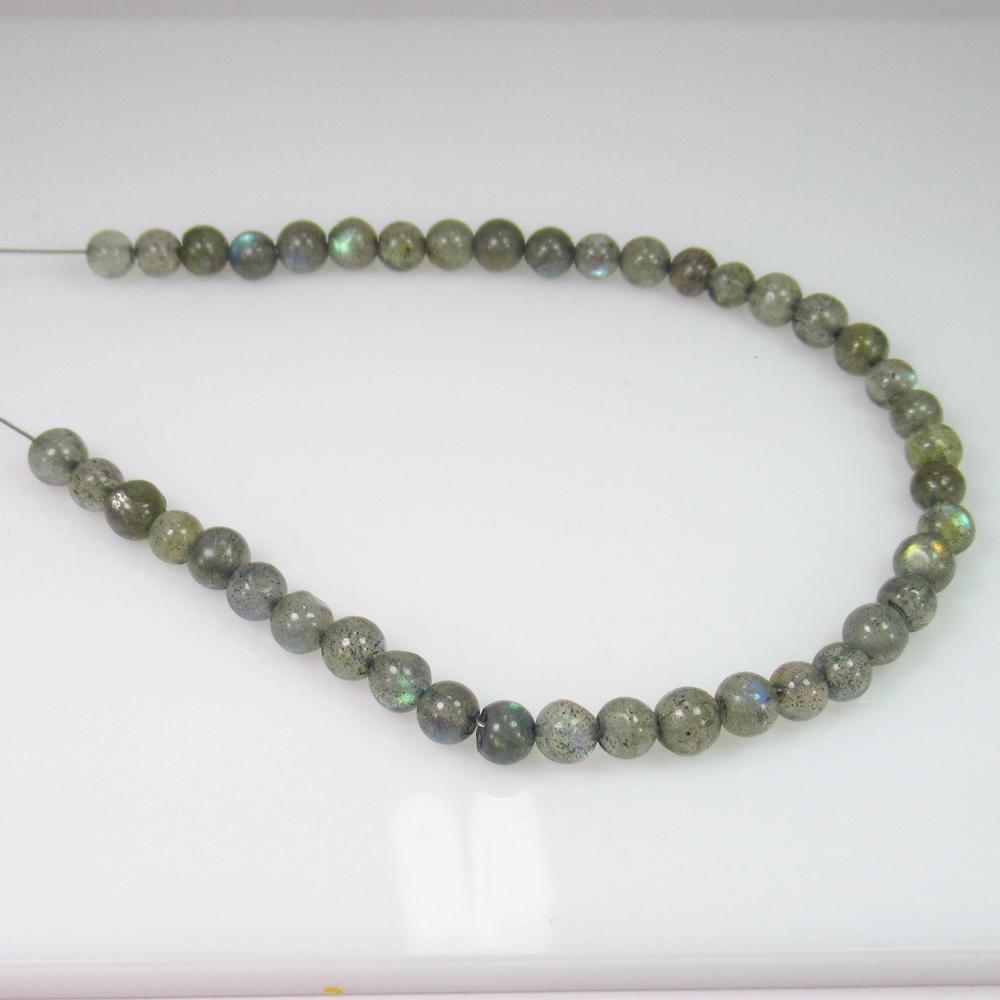20.50 Ct Genuine 42 Labradorite Drilled Ball Beads: No Reserve! Title: 20.50 Ct Genuine 42 Labradorite Drilled Ball Beads Stone Clarity: Transparent Gemstone: Natural Labradorite Beads Carat Weights: 20.50 Size/Dimensions: 3.90 - 4.50 mm / 42 PC's Dril