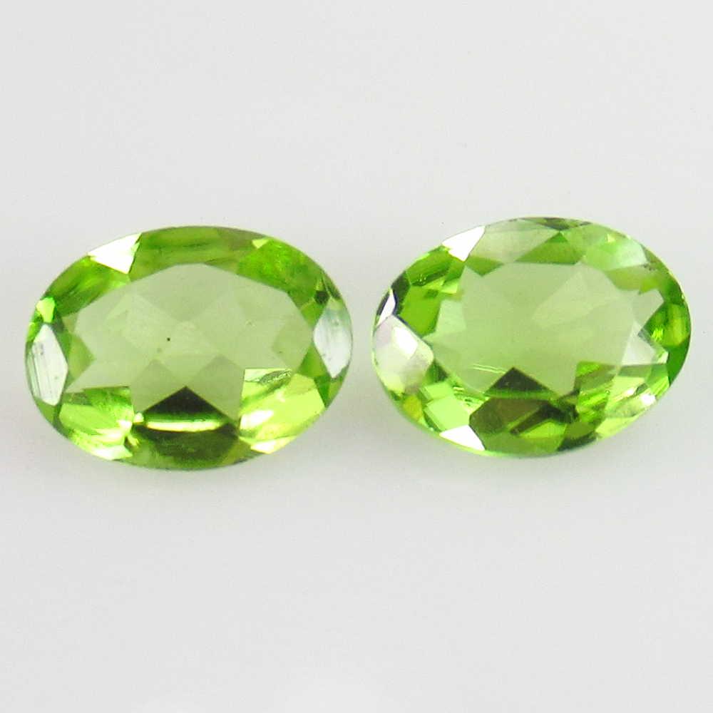 2.18 Ct Genuine Pakistan Peridot Oval Pair: No Reserve! Title: 2.18 Ct Genuine Pakistan Peridot Oval Pair Stone Clarity: VVS Gemstone: Natural Peridot Carat Weights: 2.18 Size/Dimensions: 8.10 x 6.10 x 2.90 mm / 2 PC's Top Class Full Luster / N
