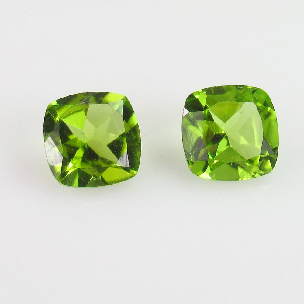 3.04 Ct Genuine Pakistan Peridot Cushion Pair: No Reserve! Title: 3.04 Ct Genuine Pakistan Peridot Cushion Pair Stone Clarity: VVS Gemstone: Natural Peridot Carat Weights: 3.04 Size/Dimensions: 7.00 x 7.00 x 4.00 mm / 2 PC's Top Class Full Luster 