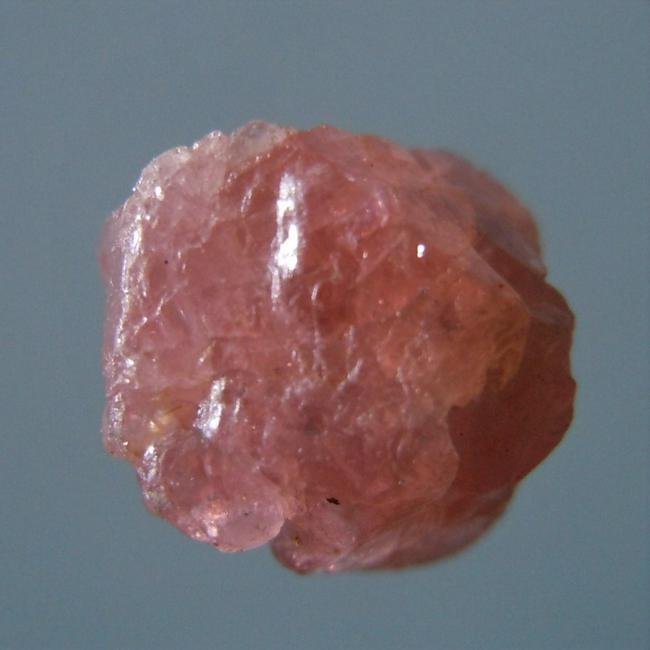 2.25 CT PINKISH-RED SPINEL - UNTREATED GEMSTONE: Title: 2.25 CT PINKISH-RED SPINEL - UNTREATED GEMSTONE Origin: Mogok Township, Mandalay Region, Myanmar Size: 0.7x0.6x0.5 cm / 0.45 gram Description: pinkish-red spinel with complex crystalline faces 