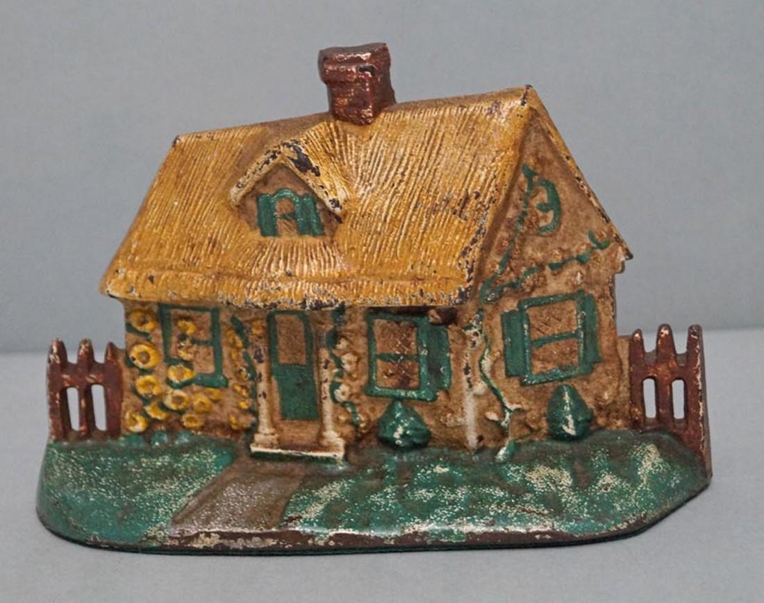 Cottage Thatched Roof Cast Iron Hubley Doorstop (1 of 5)