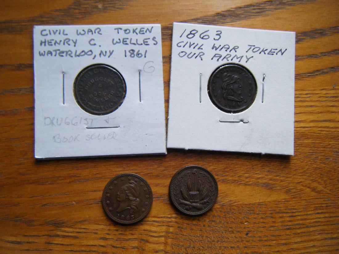 A group of 4 original Civil War Tokens (1 of 8)