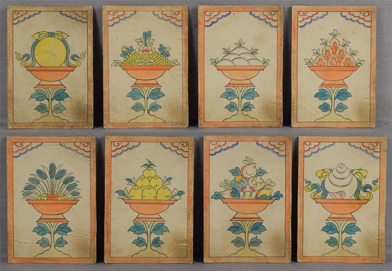 19c set of 8 TSAKLI Tibetan Buddhist paintings: A set of eight 19th century Tibetan tsakli painted with ink and colors on thick multilayered paper and depicting various altar offerings including different fruit, buns, conch shell, peacock feathers 
