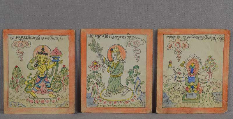 19c set of 3 TSAKLI Tibetan Buddhist paintings: A set of three 19th century Tibetan tsakli painted with ink and colors on paper and depicting a deity, a monk and an elephant, each is inscribed in Tibetan on the top. Tsakli are Tibetan Buddhist mini