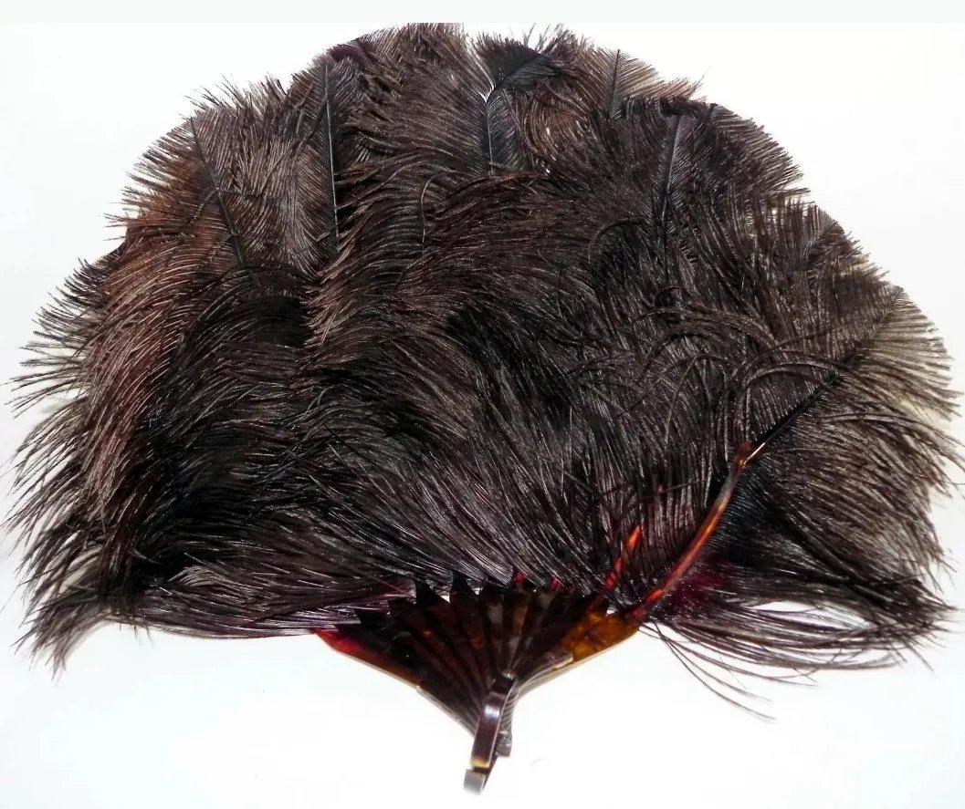 Antique 19th century hand folding dark brown Ostrich: Soft Ostrich feathers fan. Brown mink in color feathers. From the late 1800's either Victorian or Edwardian. Just a gorgeous piece for the Collector. Traditional Handle of that Era. The fingers on the