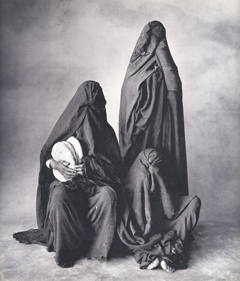 IRVING PENN - Three Women of Rissani with bread,: Artist: IRVING PENN Print Title: Three Women of Rissani with bread, Morroco, 1971 Medium: Photoengraving Printed 1970’s in the US Image size (inches) approx. 10 x 10” Irving Penn was an American p