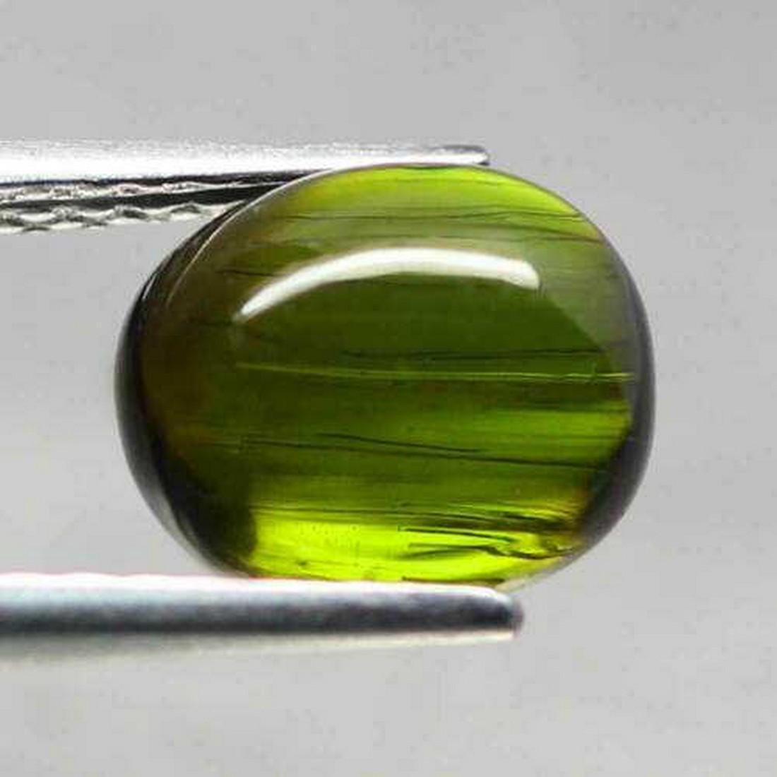 3.91 ct natural neon green tourmaline cab: No Reserve! Title: 3.91 ct natural neon green tourmaline cab Color/Clarity: neon green/VS1 Gemstone Type: natural/untreated Carat Weights: 3.91 Size/Dimensions: 7.9x5.5x9.6 mm Origin: Nigeria Shipping
