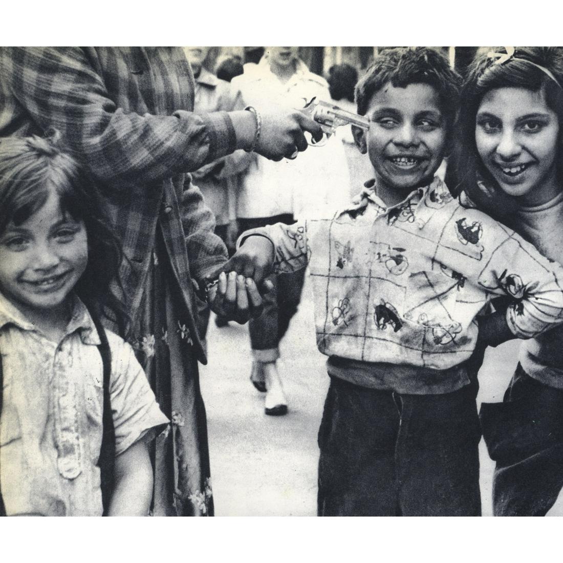 WILLIAM KLEIN - Kidding in New York: Artist: WILLIAM KLEIN Print Title: Kidding in New York Medium: Sheet-fed Gravure Printing Date: 1950's Printed in Switzerland Image Size Approx. 6.75 X 8 inches William Klein an American-born French p