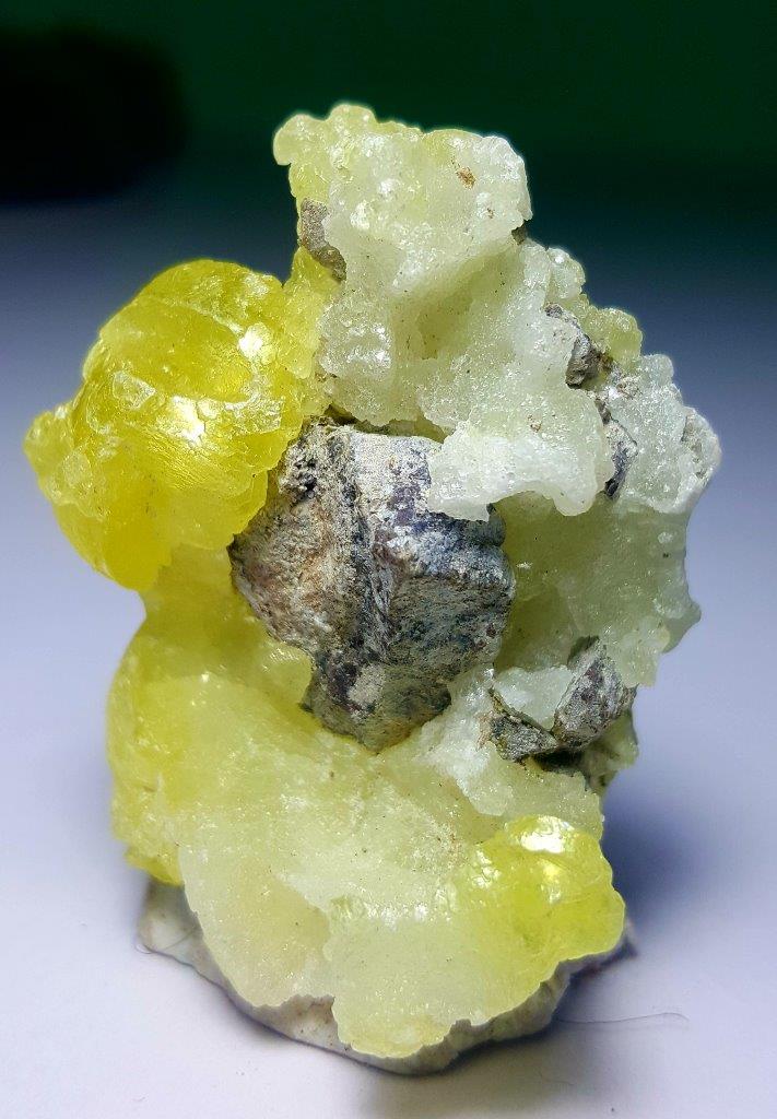 22 Grams Lemon Yellow Brucite Mineral: No Reserve! Title: 22 Grams Lemon Yellow Brucite Mineral Origin: Afghanistan Shipping: Domestic: Flat-rate of $23.00 to anywhere within the contiguous U.S. International: Foreign shipping rates are de
