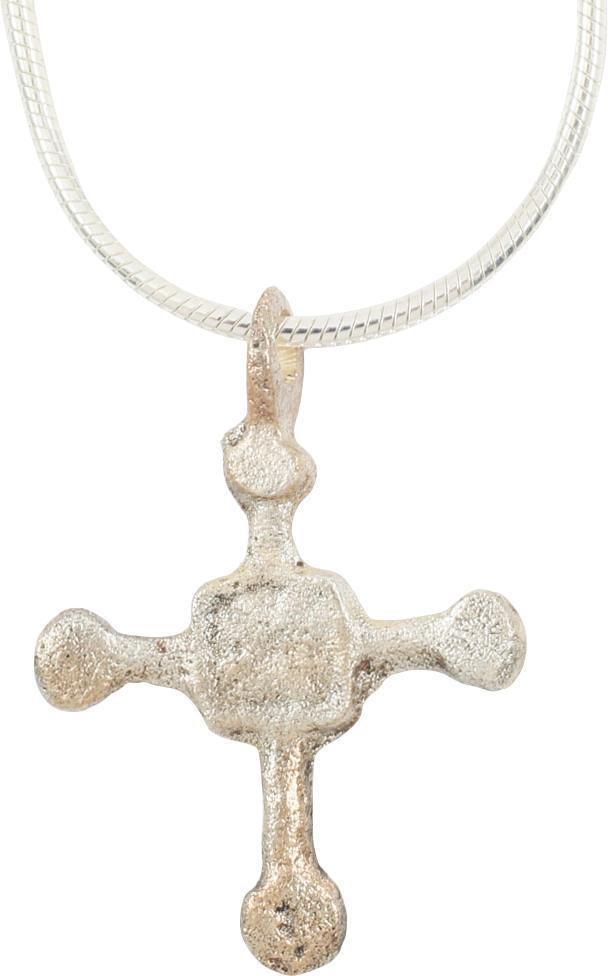 MEDIEVAL CHRISTIAN CROSS 9TH-11TH CENTURY AD: Slightly under 1” height. Silvered bronze. Disk beam terminals. The junction with a raised edge square enclosing a saltire each side. The emergence from the Dark Ages is embodied in the rise to powe