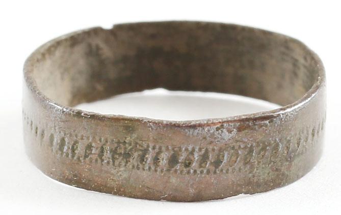 ANCIENT VIKING WEDDING RING C.850-1050 AD SIZE 3: No Reserve! Broad, 4.4mm, flat-faced band, with medial hand stippled band.. Small size for the small finger as was the custom. Fine preservation. Vikings exchanged rings on the pommel of the groom’s