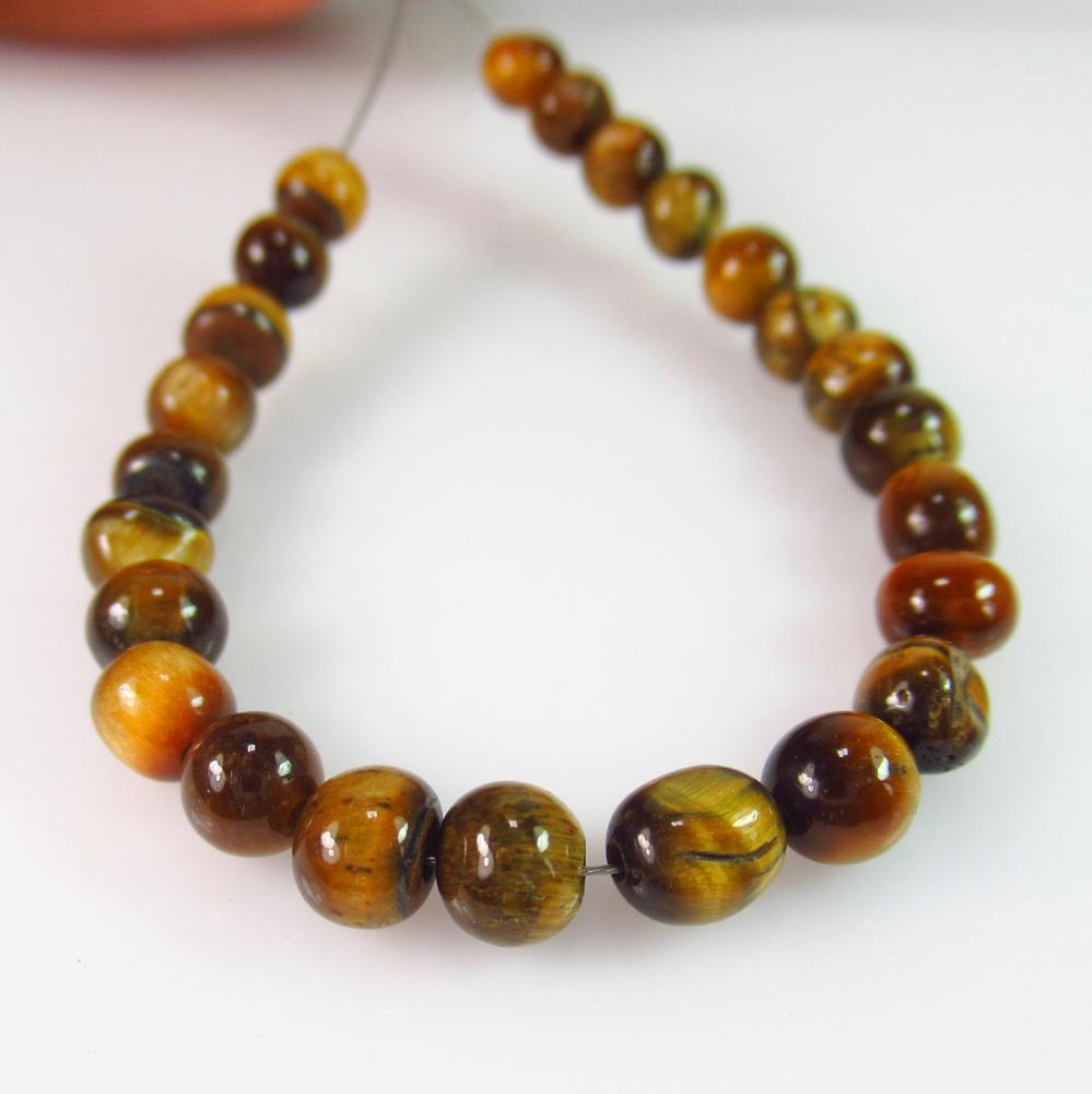 21.18 Ct Genuine 24 Drilled Tiger's eye Ball Beads (1 of 2)