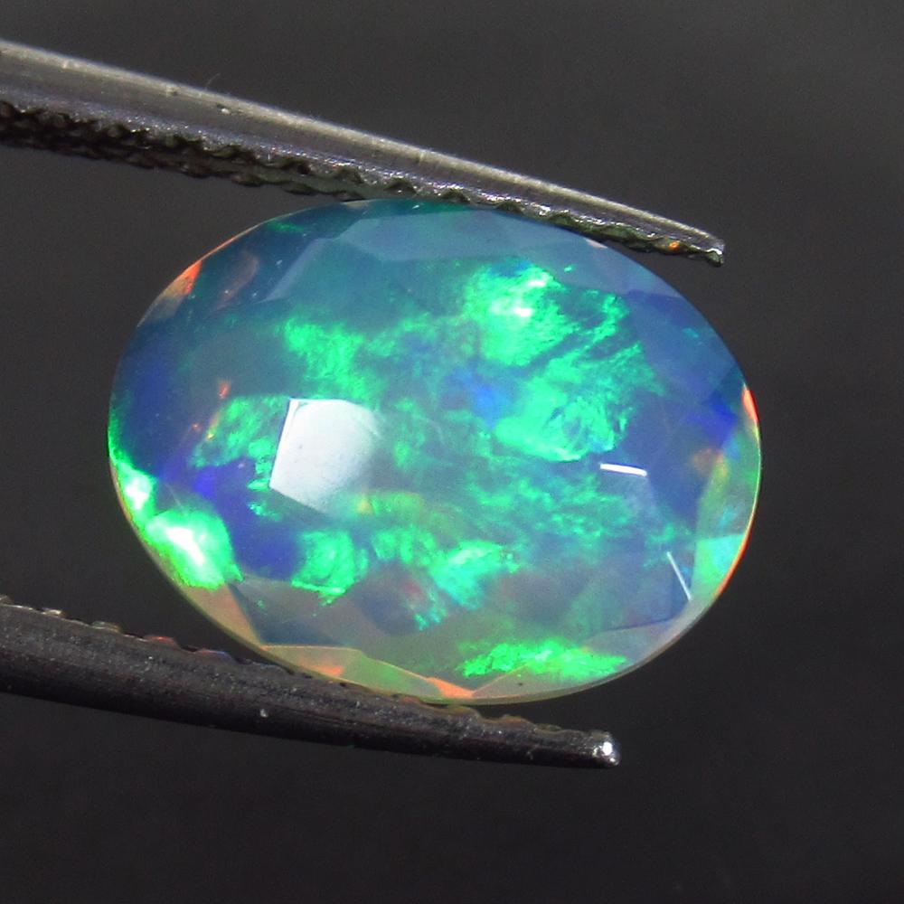 1.49 Ct Genuine Multi-Color Faceted Fire Opal Oval Cut (1 of 2)